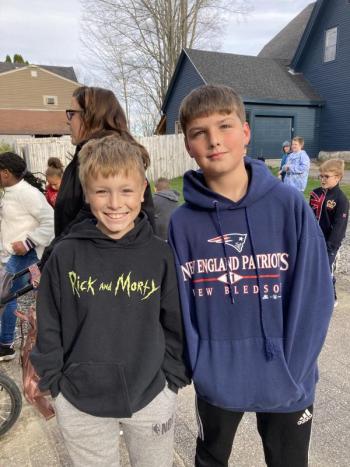 Lucas Tarrance and James Kenney are happy to have delivered their food bags. EDNA MILLER/Wiscasset Newspaper