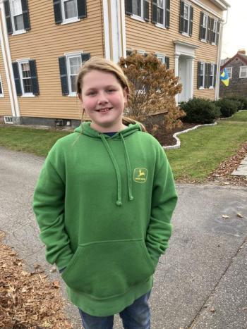 Fifth grader Reiley Kleinschmidt explains the purpose of the Turkey Trot. EDNA MILLER/Wiscasset Newspaper.