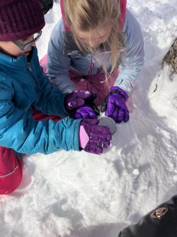 Hope Vallier and Anna Travis create a snowy home for their “animal blood” (warm jello). Becky Hallowell photo