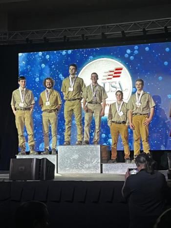Bringing home the hardware. Courtesy photo
