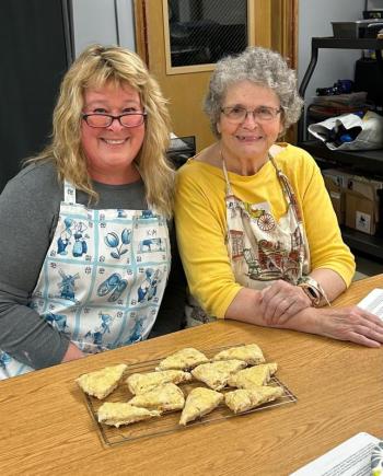 Kimberly, left, and Doris Burnham of Trevett show off their scones at the March 14 baking class with Deb Arter. Courtesy of BRAE