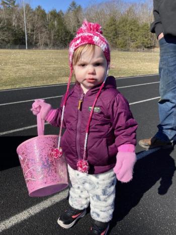 Wiscasset’s Lilyann Sawyer, 19 months, is ready to collect eggs. EDNA MILLER/Wiscasset Newspaper