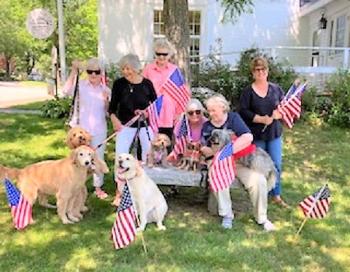 Pictured preparing for July 4 and working on the upcoming Labor Day Bands for Books to raise funds for Wiscasset Public Library are Linda Winterberg, Hannah Stewart, Kate Curran, Linda Adams, Lynn Maloney and Tracey Whitney. Canine supporters are Sandy, Stella, Cooper, Luna, Quincy and Bradley. Courtesy of Linda Adams