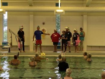 Boothbay Region YMCA Executive Director Andy Hamblett introduces the Hills family to the aqua aerobics class during the Annual Fund kick-off event. Allyson Goodwin photo
