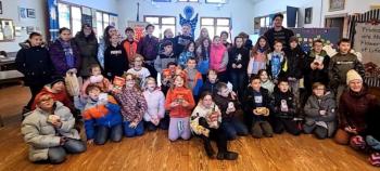 WES fourth and fifth graders, along with their teachers, after walking donations to the food pantry. Beth Bluteau photo