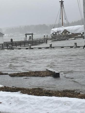 Water runs over a waterfront parking lot. In the distance, the wintering Virginia in the storm. Dennis Simmons photo