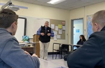 Lincoln County Sheriff Todd Brackett talks with Wiscasset students about county government and law enforcement. Courtesy photo