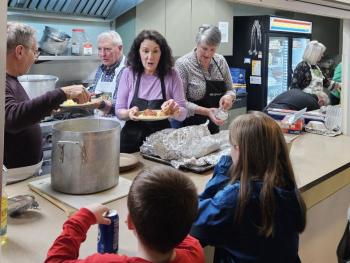 From left, Tom Cramer, Dan Watts, Sherri Dunbar, Ann Light and Carol Watts serve spaghetti dinners. Beth Bluteau photo