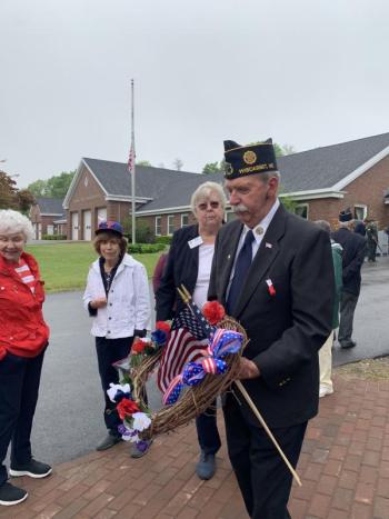 Post 54’s John Kennedy helps prepare the ceremony. SUSAN JOHNS/Wiscasset Newspaper