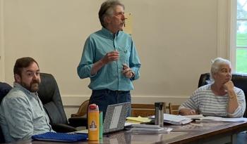 Outgoing Selectman Mike Smith explained the board’s decision not to recommend instituting a full-time fire chief position during the May 17 town meeting. BILL PEARSON/Boothbay Register