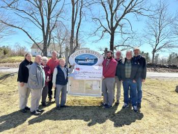 Pictured from left are: Carrie Kipfer (LC Administrator), Randel Manning (LCI Vice-President of Operations and Engineering), Mary Ellen Barnes (Coastal Maine Reg Broadband), Robert Clifford (South Bristol Selectman), Brian Boisvert (South Bristol Broadband Committee), Evan Goodkowsky (CMRB), Alan Hinsey (LCI Director of Marketing and Sales), Bruce Farrin (South Bristol Selectperson), and JIm Corbett (LCI Manager of Engineering/OSP Engineer). Courtesy photo