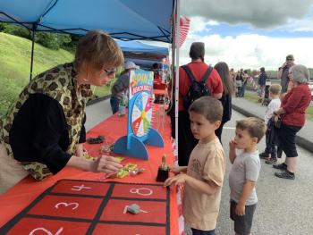Lucia Droby explains a game. SUSAN JOHNS/Wiscasset Newspaper