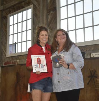 Chef Lori Mitchell accepting the Chef’s Award for Best Lobster Bite for Boothbay Craft Brewery. LISA KRISTOFF/Boothbay Register