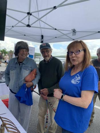 From left, Wiscasset’s Wendy Ross and Tom Eichler with Historic New England’s Peg Konitzky at an exhibit on Wiscasset’s worm-digging heritage. SUSAN JOHNS/Wiscasset Newspaper