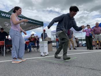 Eleanor Lynch and brother James, both of Alexandria, Virginia, take part in the relay at Wormfest June 8 in Wiscasset. SUSAN JOHNS/Wiscasset Newspaper