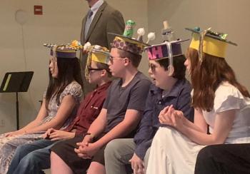 Edgecomb Eddy sixth grade graduates received class gifts June 14 such as sunglasses, mortarboards and crayon stars. BILL PEARSON/Boothbay Register