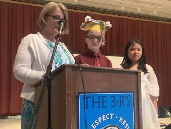 Second grade teacher Jennifer Gosselin, left, presented The Sara Leone Outstanding Citizenship Award to Curtis Spofford and Ariel Doan, right, during the June 14 graduation ceremony. BILL PEARSON/Boothbay Register