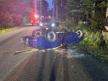The overturned Porsche on Back Narrows Road on Friday, July 19. Mark Sullivan photo