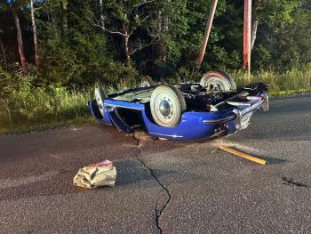 The overturned Porsche on Back Narrows Road on Friday, July 19. Mark Sullivan photo