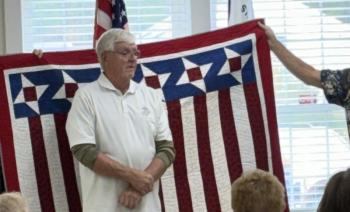 U.S. Marine Corps veteran Phil Chapman received a quilt Sept. 21 in appreciation for his military service. Courtesy photo phil chapman