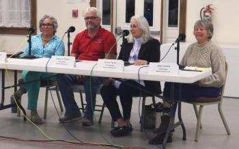 From left: Senate District 24 candidates Suzanne Andresen, I-West Bath; Jeffrey Pierce, R-Dresden; Denise Tepler, D-Topsham; and House District 53 candidate Judith "Judy" Tunkle, D-Dresden; smile as audience members applaud at the end of a forum at Pownalborough Hall in Dresden the evening of Monday, Sept. 30. Piper Pavelich photo Dresden panel
