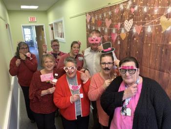 Staff members at the Family Care Center celebrate Valentine's Day. KEVIN BURNHAM/Boothbay Register