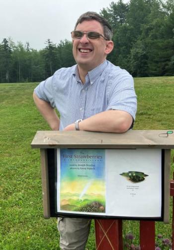 Matt Brough with one of the Story Walk Houses Mobius built and installed at Medomak Valley High School. ECB photo Matt Brough with one of the Story Walk Houses Mobius built and installed at Medomak Valley High School.