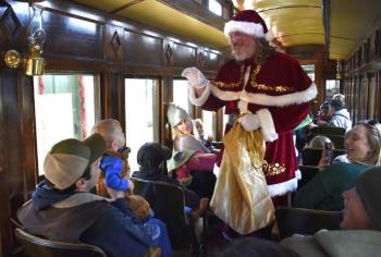 Santa greets passengers on the train during the North Pole Express. ISABELLE CURTIS/Boothbay Register