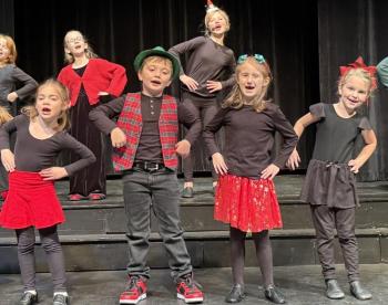 Front row: Cora Tindal, Oscar Mirabile, Josie Roy, Jackie Cronk; back row: Finley Piercy, and Kaylee Wayda perform in "We Are Santa's Elves". Front row: Cora Tindal, Oscar Mirabile, Josie Roy, Jackie Cronk; back row: Finley Piercy, and Kaylee Wayda perform in "We Are Santa's Elves".