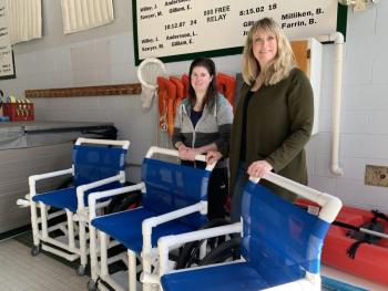 WCC Aquatics Director Nori Mcleod, left, and Wiscasset’s Julee Ketelhut with the water wheelchairs Jan. 17. SUSAN JOHNS/Wiscasset Newspaper 