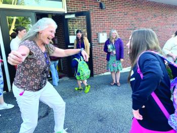 Wiscasset Elementary School fourth grade teacher and Lincoln County Teacher of the Year Becky Hallowell, who a month later would be named Maine Teacher of the Year, greets incoming fifth grader Patience Davis Tuesday morning, Sept. 3, the start of the new school year. SUSAN JOHNS/Wiscasset Newspaper 