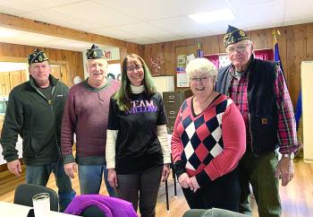 From left, American Legion Post 54’s Cliff Hendricks and Mike Barnes, Team Willow’s Beth Bluteau, Cooper-DiPerri Scholarship Fund Committee member Sheila Sawyer and Post 54 Cmdr. William Cossette Jr. gather at the Legion hall on Route One, Wiscasset March 22 to talk about the post’s recent donations to both causes. SUSAN JOHNS/Wiscasset Newspaper 