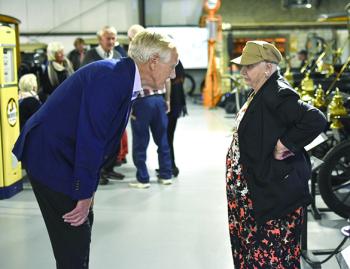 Angus King speaks to a resident during a celebration for the Boothbay Railway Village. FRITZ FREUDENBERGER/Boothbay Register