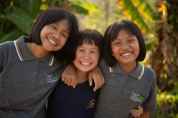 These three young girls are currently being supported at Friends of Thai Daughters’ Sunflower Farm in Mae Chan, Northern Thailand. Courtesy of FTD