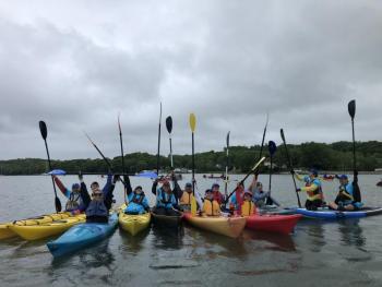 A Knickerbocker Group team on the Damariscotta River during a recent Paddle for a Purpose. Courtesy of Hearty Roots