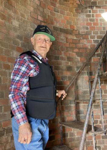 George McEvoy climbing the spiral stairs of the Ram Island Lighthouse. Elaine P. Jones photo