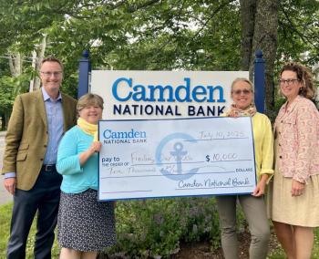  Simon Griffiths, CEO of Camden National Bank, with, from left, Finding Our Voices Board Member Elizabeth True; CEO and Founder Patrisha McLean, and Tina Flewelling, manager of the Blue Hill branch of Camden National Bank.  Photo courtesy Finding Our Voices