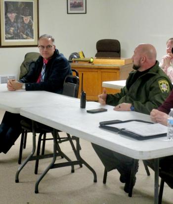WCS Principal Jason Libby (l) and Jason Warlick, chief deputy for the Sagadahoc County Sheriff’s Office at Wednesday's select board meeting. PHIL DI VECE/Wiscasset Newspaper