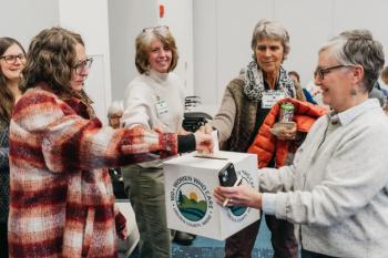 100+ Women Who Care Lincoln County members vote at the January meeting. Melissa Keyser photo