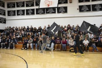 Lincoln Academy athletes celebrate the start of the fall sport season with the running of the Spirit Flags. Courtesy of Hilary Petersen