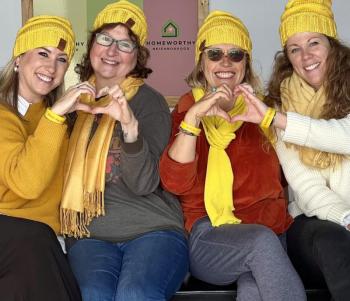 Celebrating how their Midcoast-based nonprofits are collaborating to bring more love to the area's most vulnerable residents are from left: Molly Feeney, executive director of Homeworthy; Mary Kamradt, operations manager of Finding Our Voices; Patrisha McLean, CEO and Founder of Finding Our Voices, and Shannon Shimer, assistant director of Social Services at Homeworthy. Courtesy of Finding Our Voices