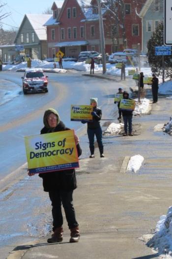 New signs by Lincoln County Indivisible on display this past weekend. Courtesy photo