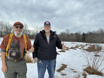 On this parcel on Wiscasset’s Route 27, prospective land donor Allen “Big Al” Cohen, left, and Boothbay V.E.T.S. founder Ed Harmon show their enthusiasm March 8 for the project   eyed to help veterans. SUSAN JOHNS/Wiscasset Newspaper