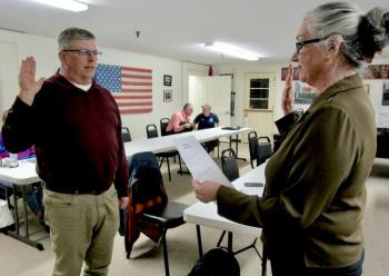 Mike Field is sworn in as Health Officer by Town Administrator Kim Dalton. Field also serves as the town’s Code Enforcement Officer. PHIL DI VECE/Wiscasset Newspaper