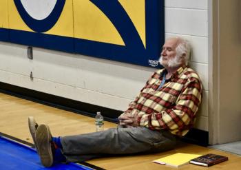 Rob Stevens takes in the town meeting proceedings. PHIL DI VECE/Wiscasset Newspaper