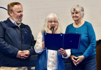 Mary King, (far right) a Woolwich ballot clerk for 50 years was the recipient of the town’s “Spirit of America” award. Also pictured are Selectman Jason Shaw and Allison Helper. PHIL DI VECE/Wiscasset Newspaper