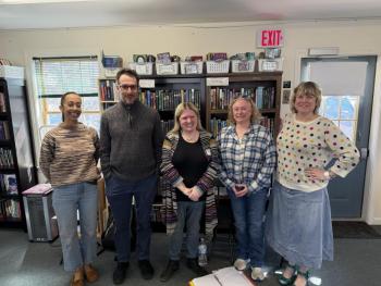 Stacey Adams, far left, and Angela Lathem-Ballard, far right, welcome visiting teachers into their writing and reading classrooms at CTL. Courtesy photo