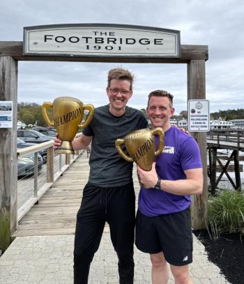 Runner-up Christoph Aeppli and winner Kevin Posman pose with their trophies May 15 during Bigelow's tenth annual Fun Run & Walk for Colorectal Cancer Awareness.  Courtesy of Leah Campbell
