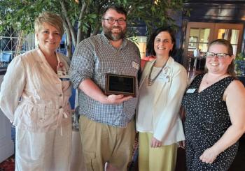 from left are: MaineHealth Lincoln Hospital President Cindy Wade, RN, MHA; Healthy Lincoln County Associate Program Manager Will Matteson; Coulombe Center Director Anni Pat McKenney and Community Routes Project Coordinator Samantha Mehlhorn. Courtesy photo