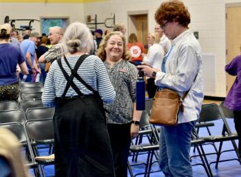 Lesley Dolinger, Patten Free Library’s Executive Director (c) was all smiles following the special town meeting. PHIL DI VECE/Wiscasset Newspaper